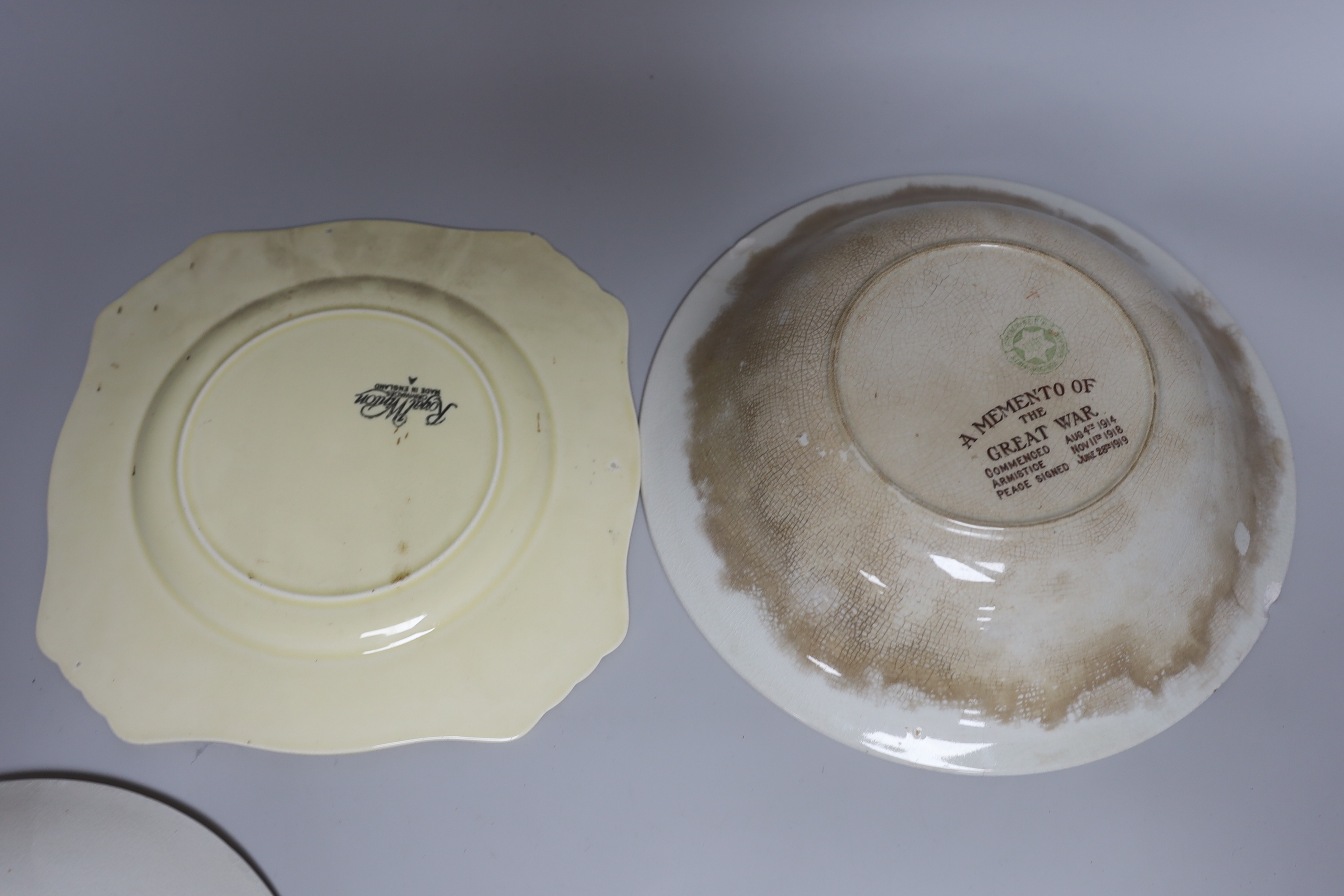 Three Bruce Bairnsfather 'Old Bill' pottery dishes and a bowl, by Grimwades, all printed with World War caricature subjects (4)